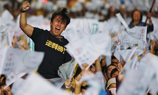  A Tsai supporter celebrates the election results. Photograph: Damir Sagolj/Reuters 