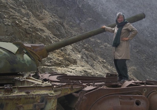 Unarmed Peacekeeper Linda Sartor with an Afghani tank.